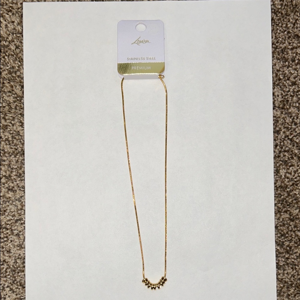 Gold Stainless Steel Delicate Necklace with Curved Bead Accent
